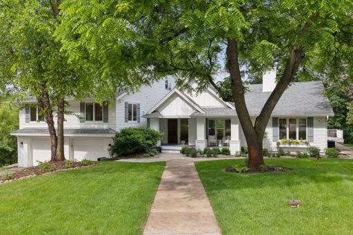 Storybook Curb Appeal with pool, and newly resurfaced, multi use sport court.