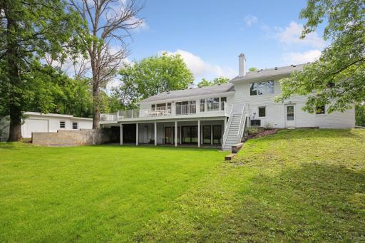 Stairway access from main level to back yard