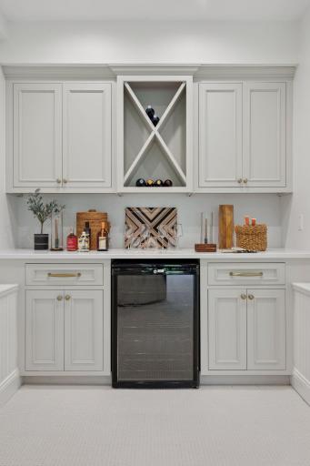Convenient Wetbar and liquor storage, enough space for a pool or ping pong table