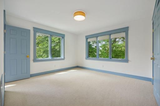 Two sets of windows, with beautiful natural surroundings outside. Bed #2