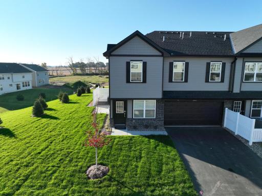 5285 Long Pointe Passm with large side yard space next to single family homes