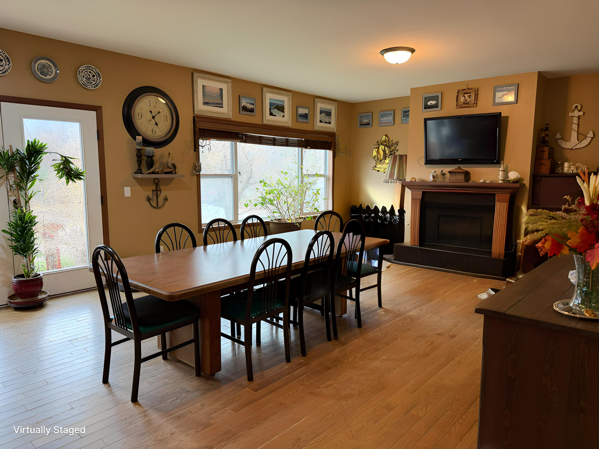 Spacious informal dining. currently large table but room for furniture next to the fireplace too.