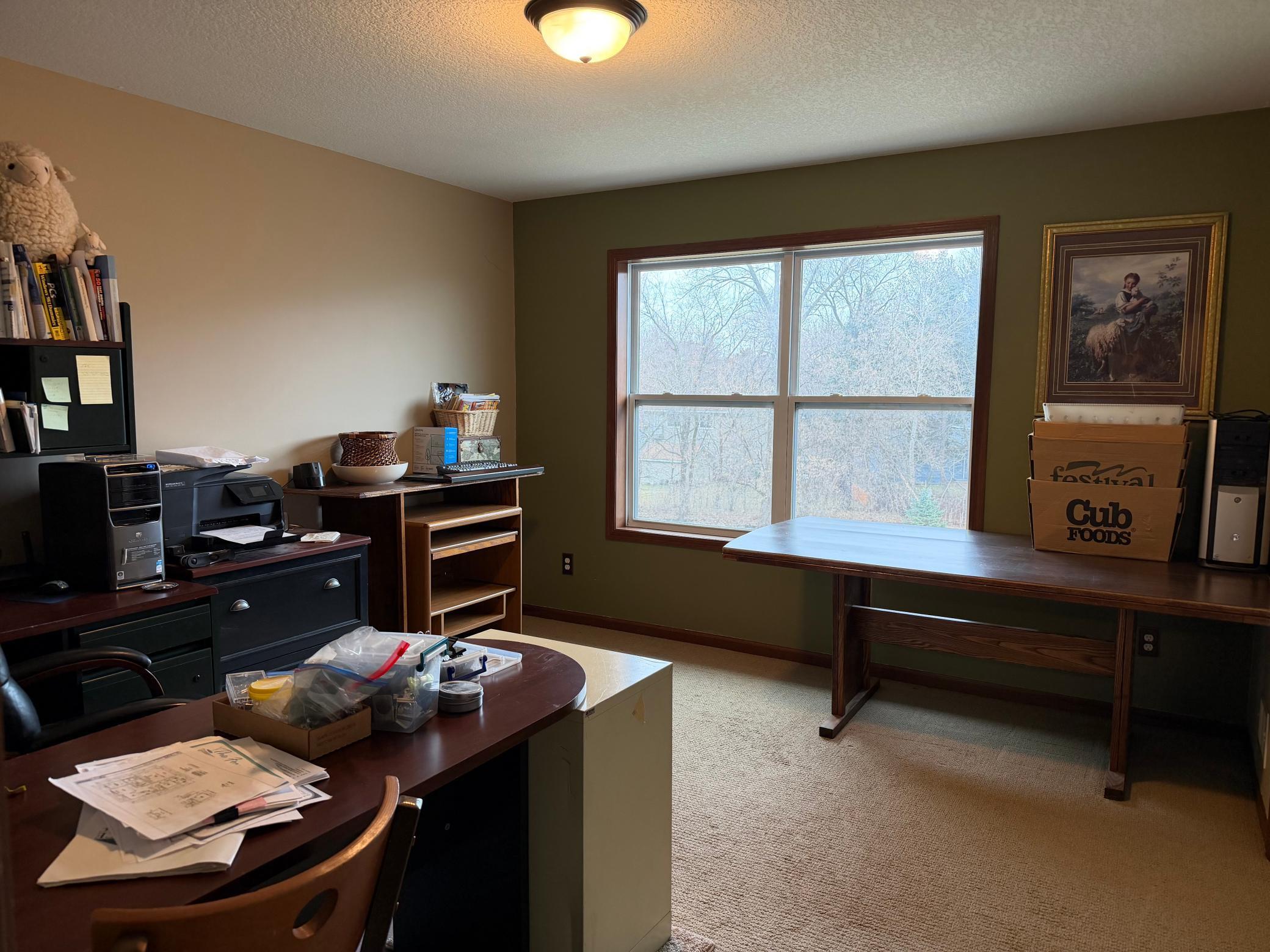 Bedroom 4 upstairs currently used as an office has a massive walk in closet