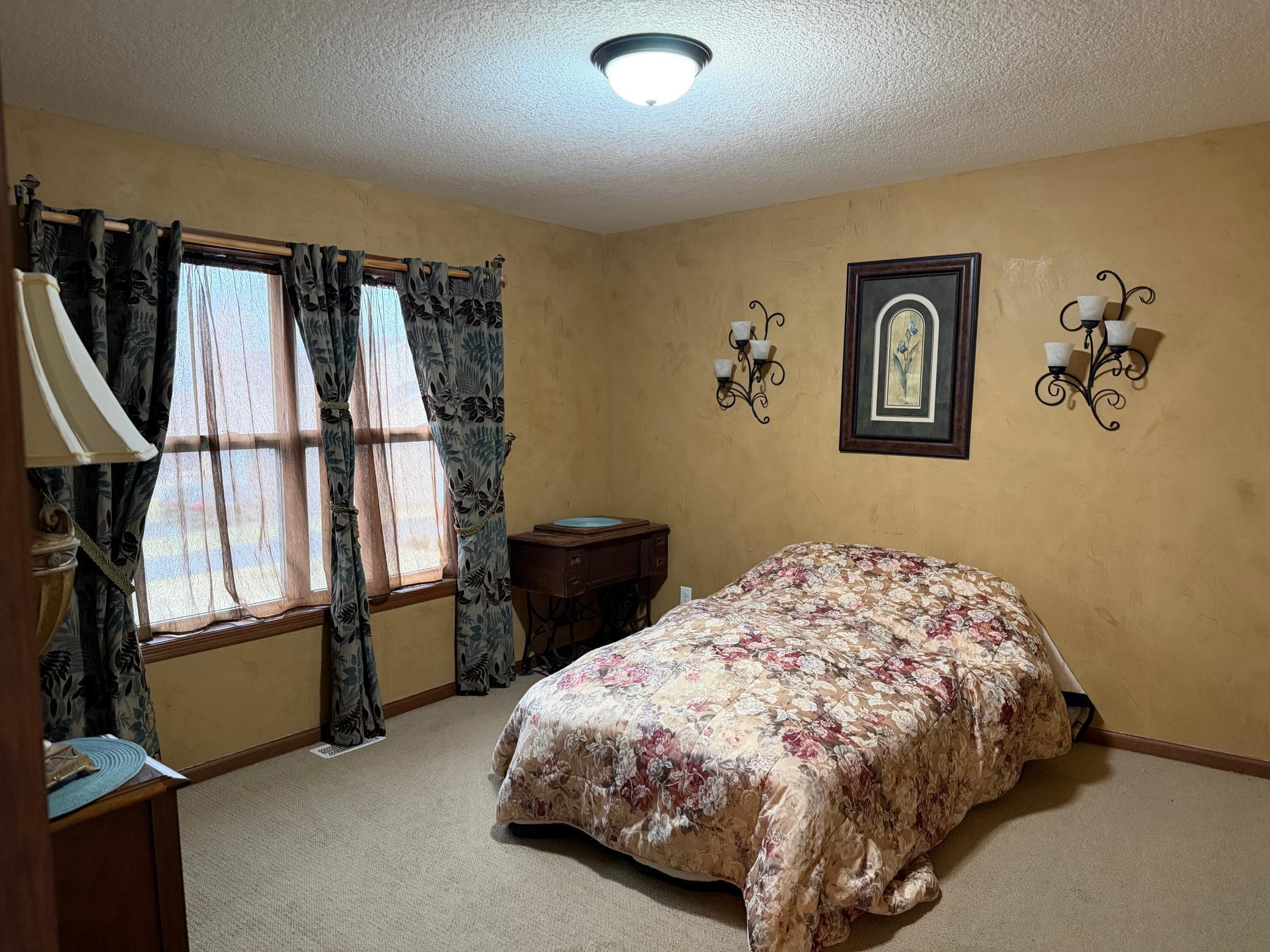 Bedroom 3 upstairs has faux walls, and a large walk in closet