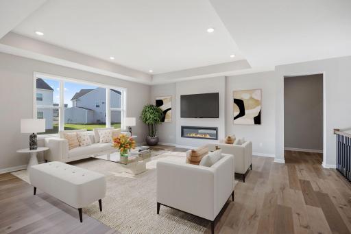 Spend time with family and friends in the comfort of your living room. (Pictures of actual home)