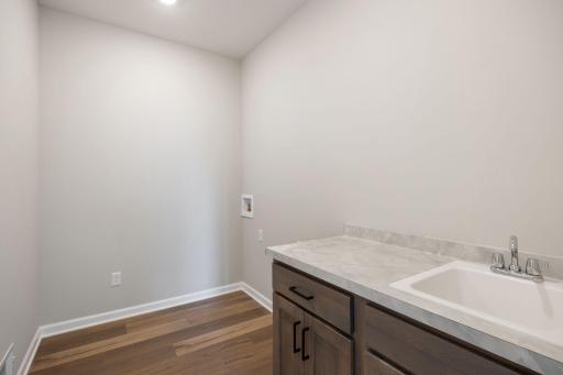 Laundry room with laundry sink cabinet