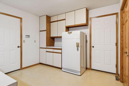 Large mud/laundry room offers 2 different access points to the 5-car garage