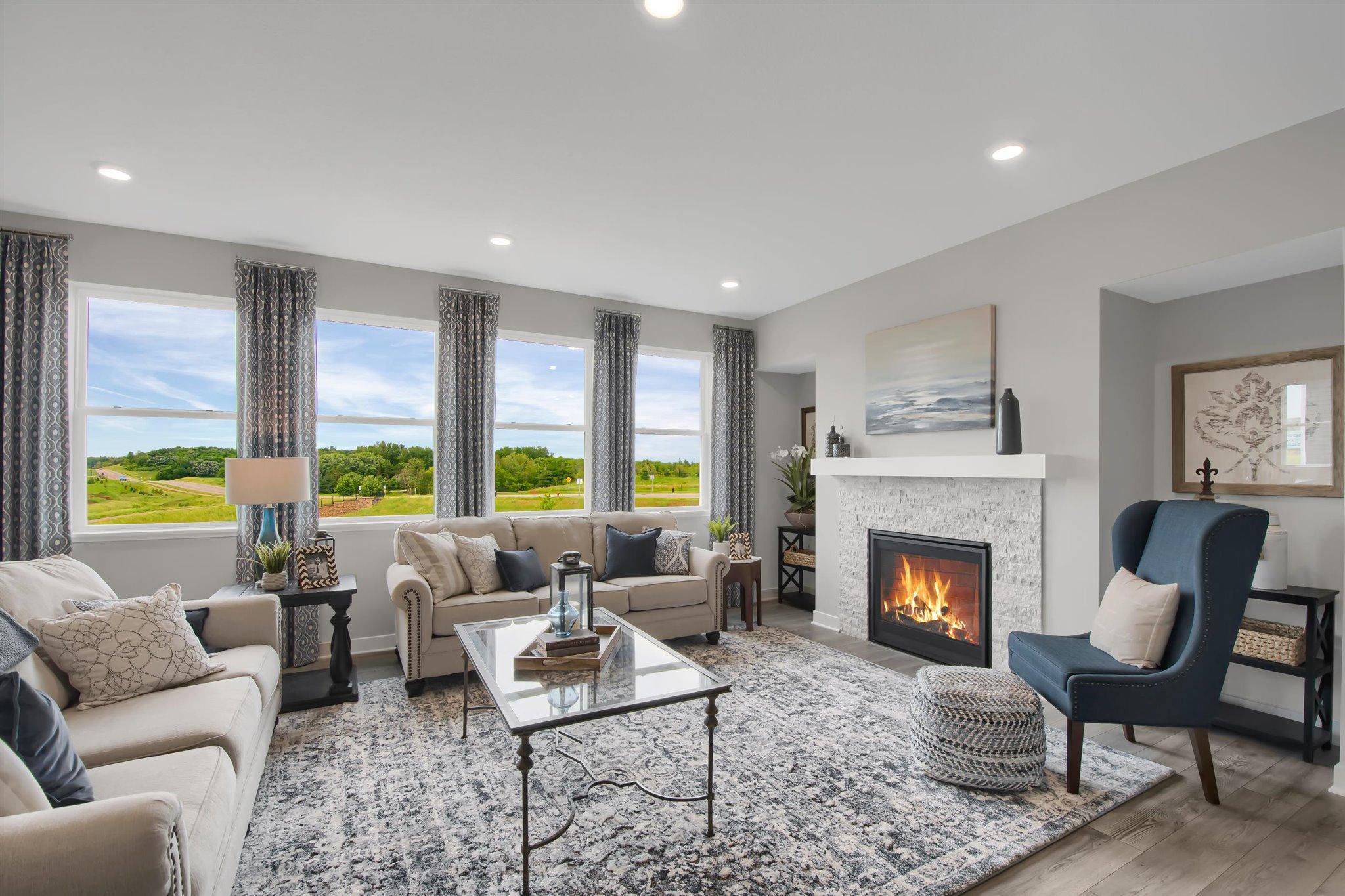 Family room on main floor with gas fireplace.