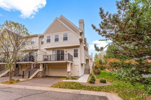 Welcome home! Fabulous end unit with green space!