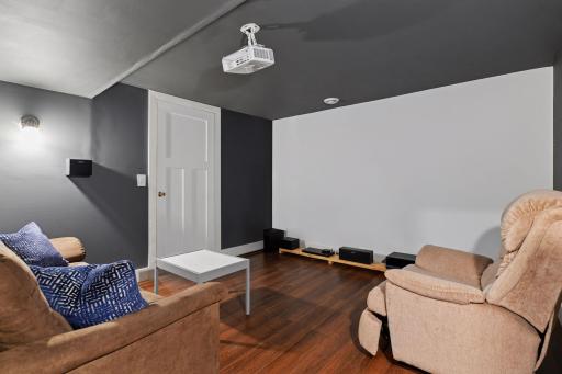 A special surprise, the lower level features a private Home Theatre - snuggle up with a bowl of popcorn and make your next movie night an event!