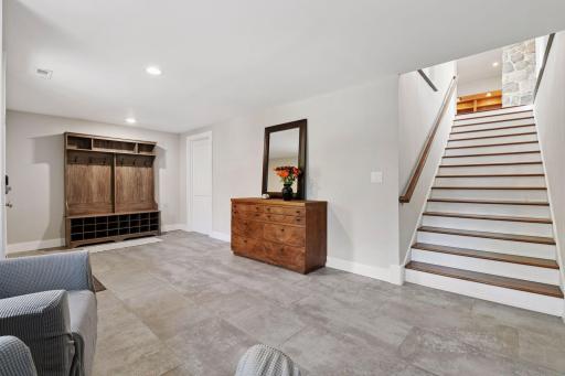 The Mud Room on the ground level is both functional and inviting - just off the space is the second laundry and mechanical room with offers another roughed-in for a guest bathroom.