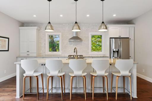 The all new Chef's Kitchen is sure to become the heart of your home and everyone's favorite gathering place - the space features a 10-foot island and custom cabinetry with soft-close doors and drawers.