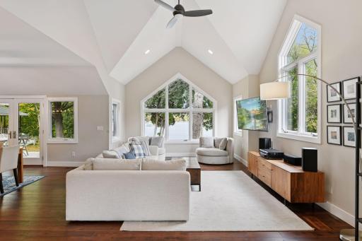 Step inside to discover an open floor plan on the main level featuring a vaulted Family Room with large windows and high ceilings.