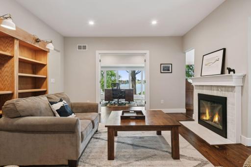 Curl up in front of the wood burning fireplace with a good book and enjoy this inviting space.