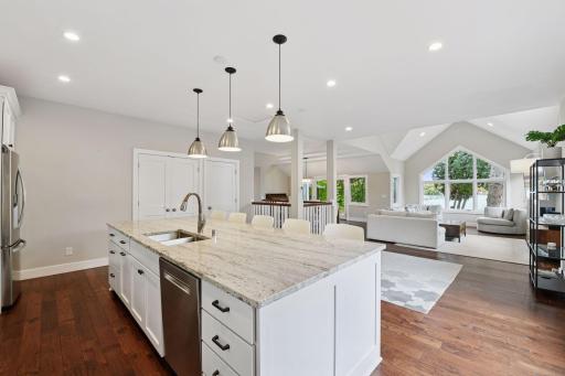 The Kitchen features room for a breakfast table and offers two storage spaces - one houses the main level laundry room and the second is a walk-in pantry.