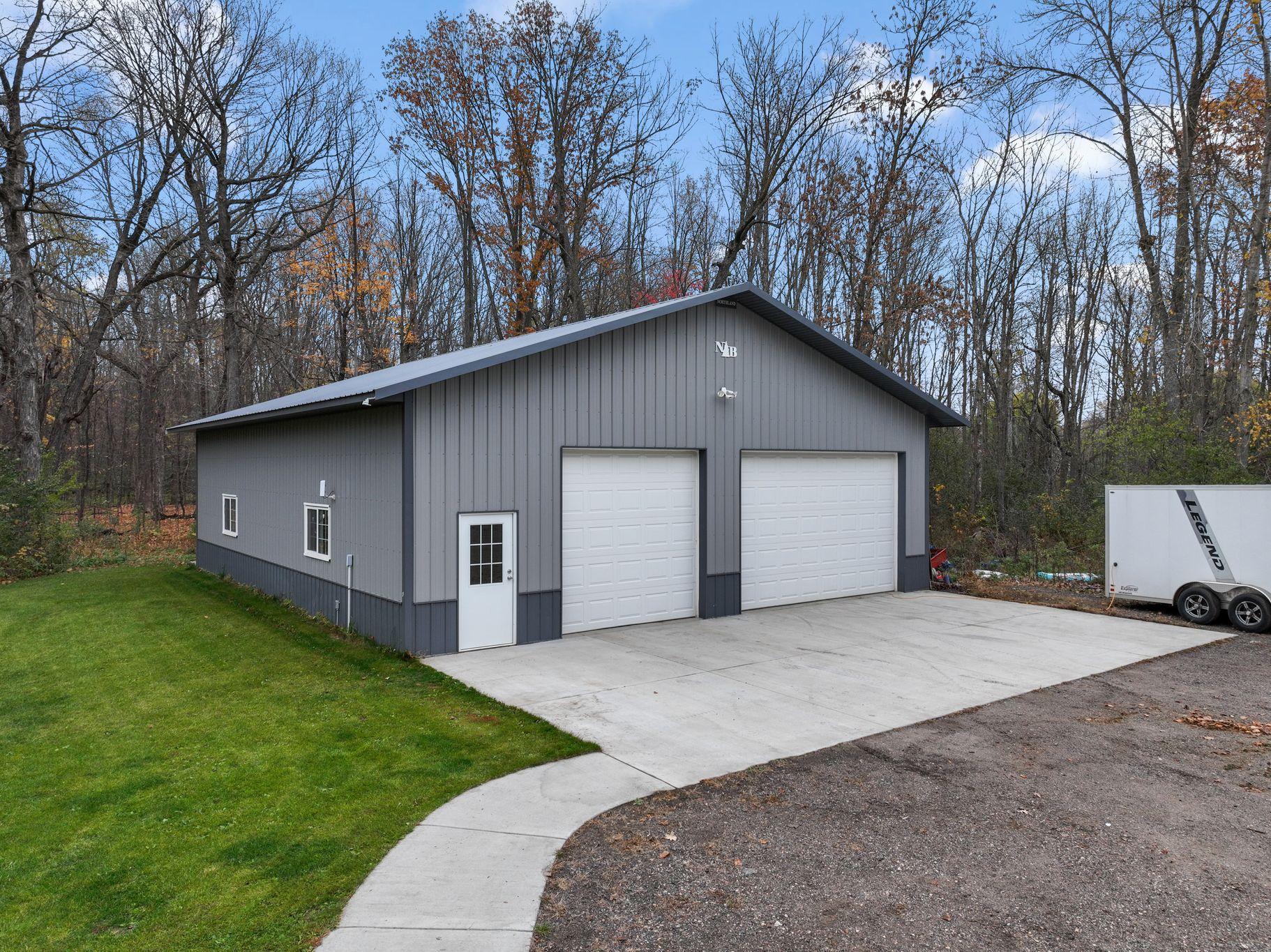 The 40x48 pole building added in 2018 features 10 foot doors, 12 foot sidewalls, a 10 foot wide door and a 16 foot wide door, concrete, electric and wifi.