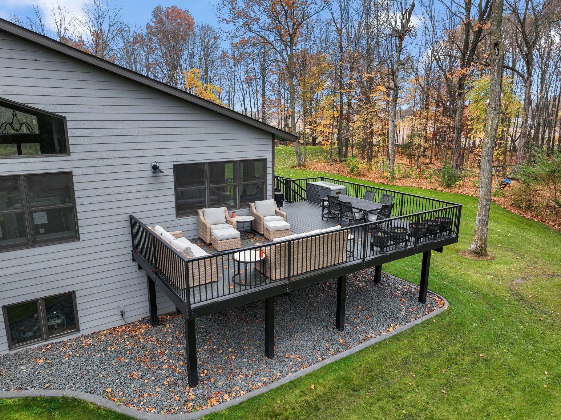 This custom maintenance free deck with all aluminum railing and composite decking was added in 2022.