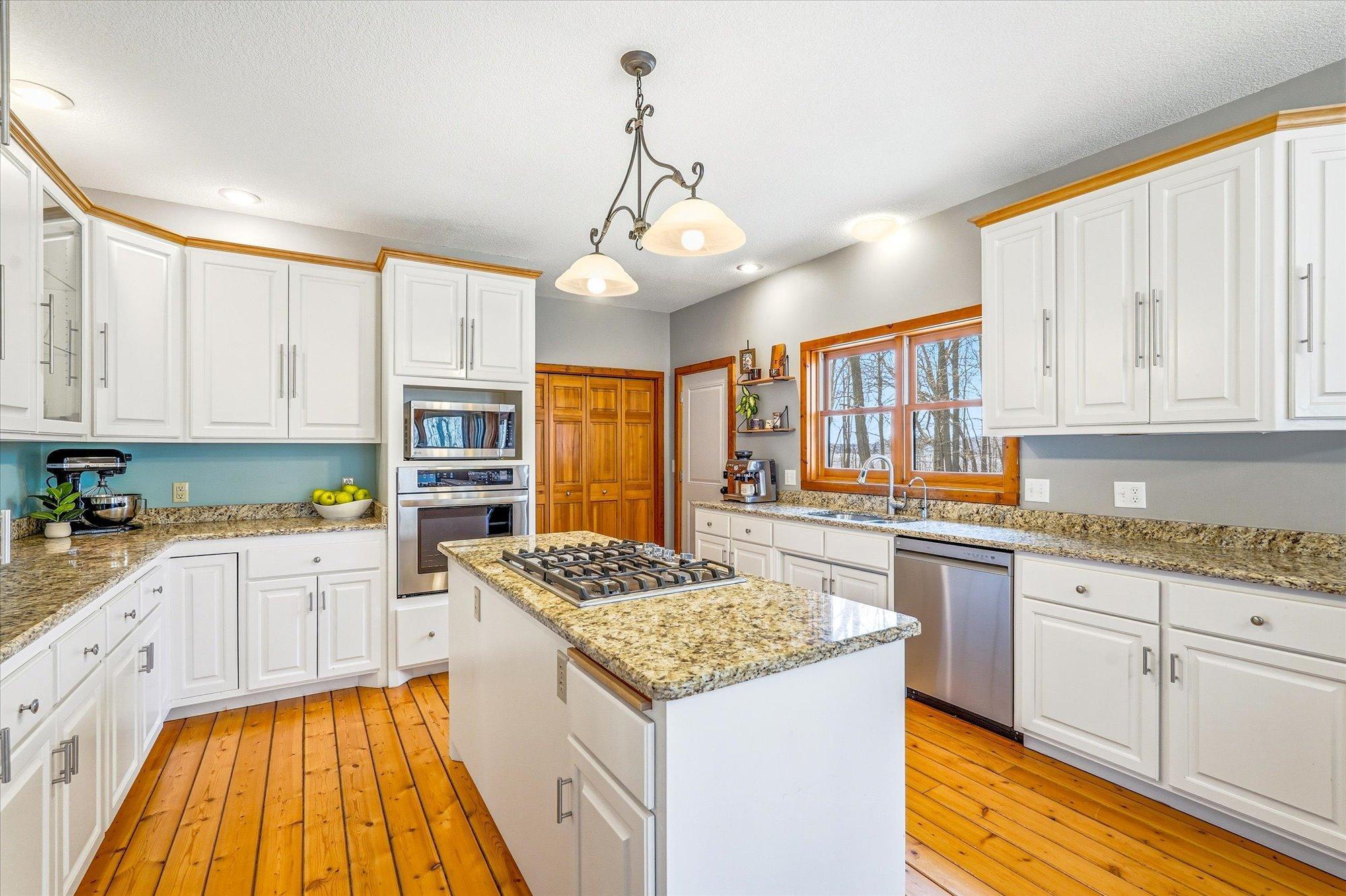 In addition to the ample cabinetry, there is a large walk-in pantry and an additional closet in the kitchen-you will not struggle with storage!