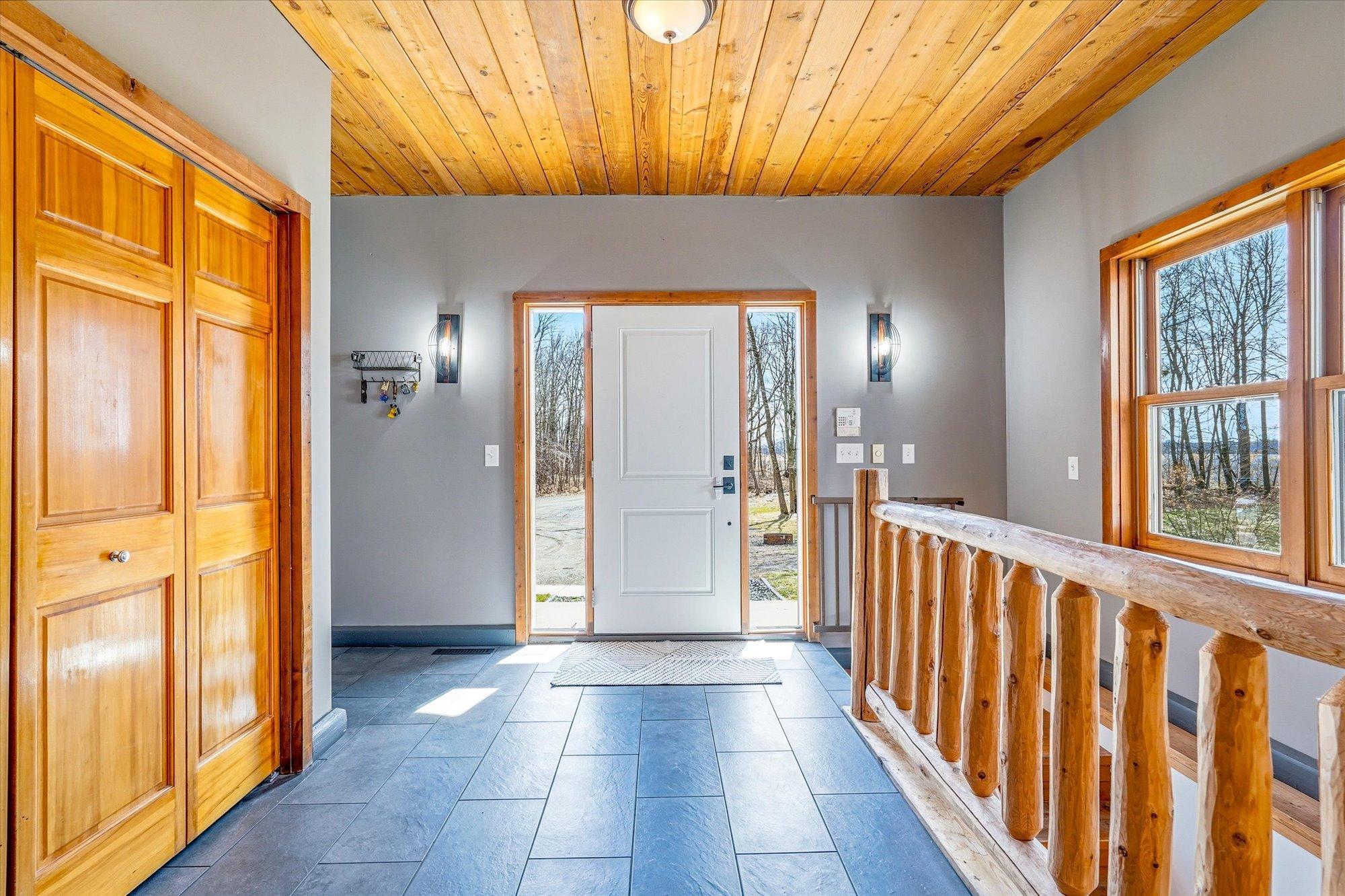 The grand foyer features brand new tile installed in 2026.
