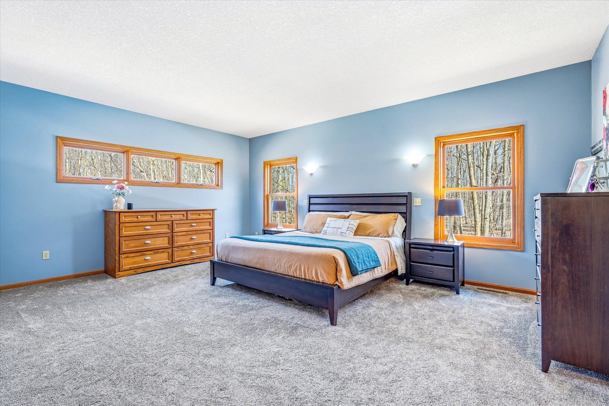 The expansive primary suite has brand new carpet added in 2026.