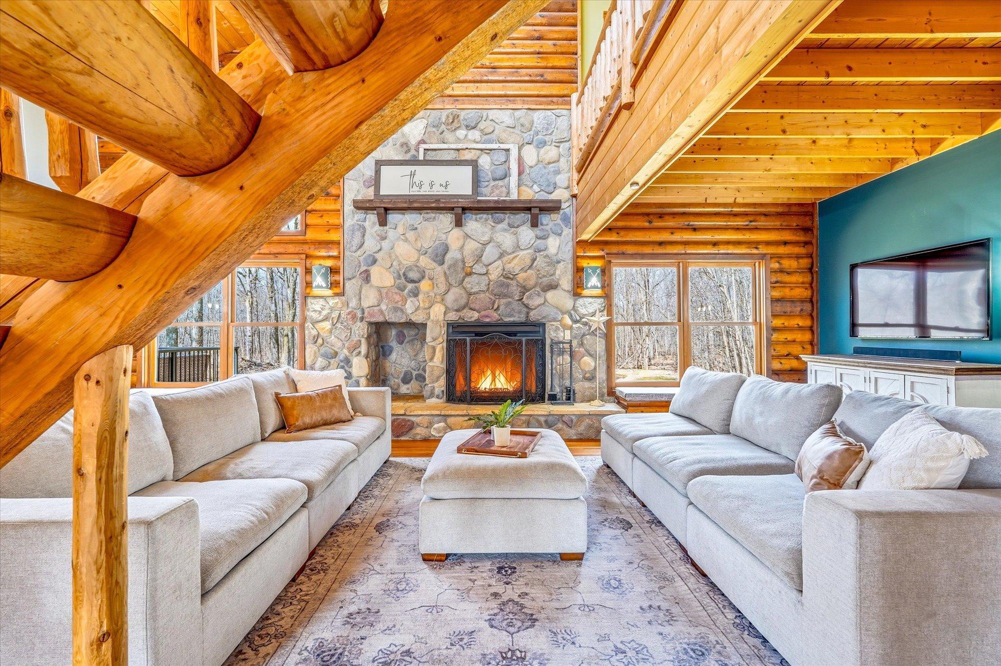 Imagine cozy nights by the fireplace in this lodge-like home.
