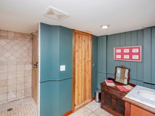 Lower Level 3/4 Bath, sauna currently being used as a wine cellar.