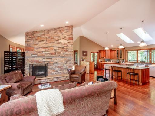 Open floor plan with two sitting area. Open kitchen which leads to screen porch.