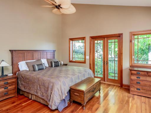 Primary Main Floor walks out to private deck.