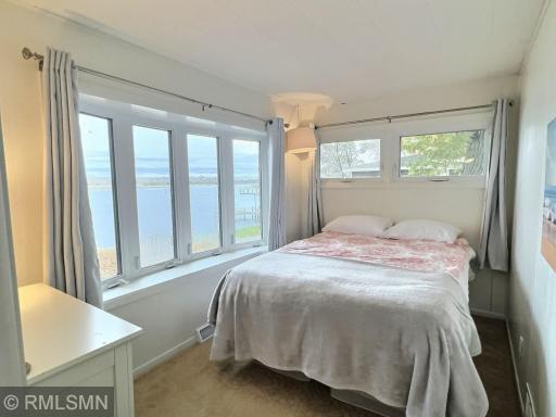 This flex space can be used for whatever you choose current owner use it as additional sleeping quarters. Part time home office at the lake has a nice ring to it.
