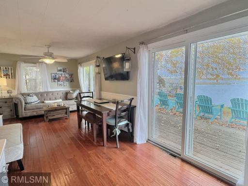 Expansive lakeside windows bring the outdoors in, filling the home with natural light and stunning water views.