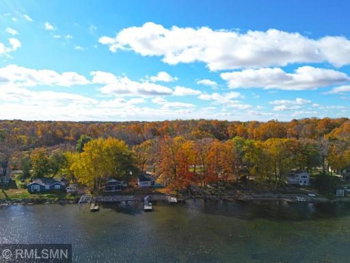 Aerial shot from the lake to the south. Property is located on dead end road so traffic is minimal.
