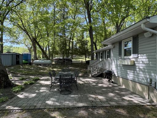 With several outdoor entertaining areas, thereâs no shortage of spots for friends and family to relax and soak in the lake atmosphere. The canopy of trees provides relief from all the sun and fun on the lake.