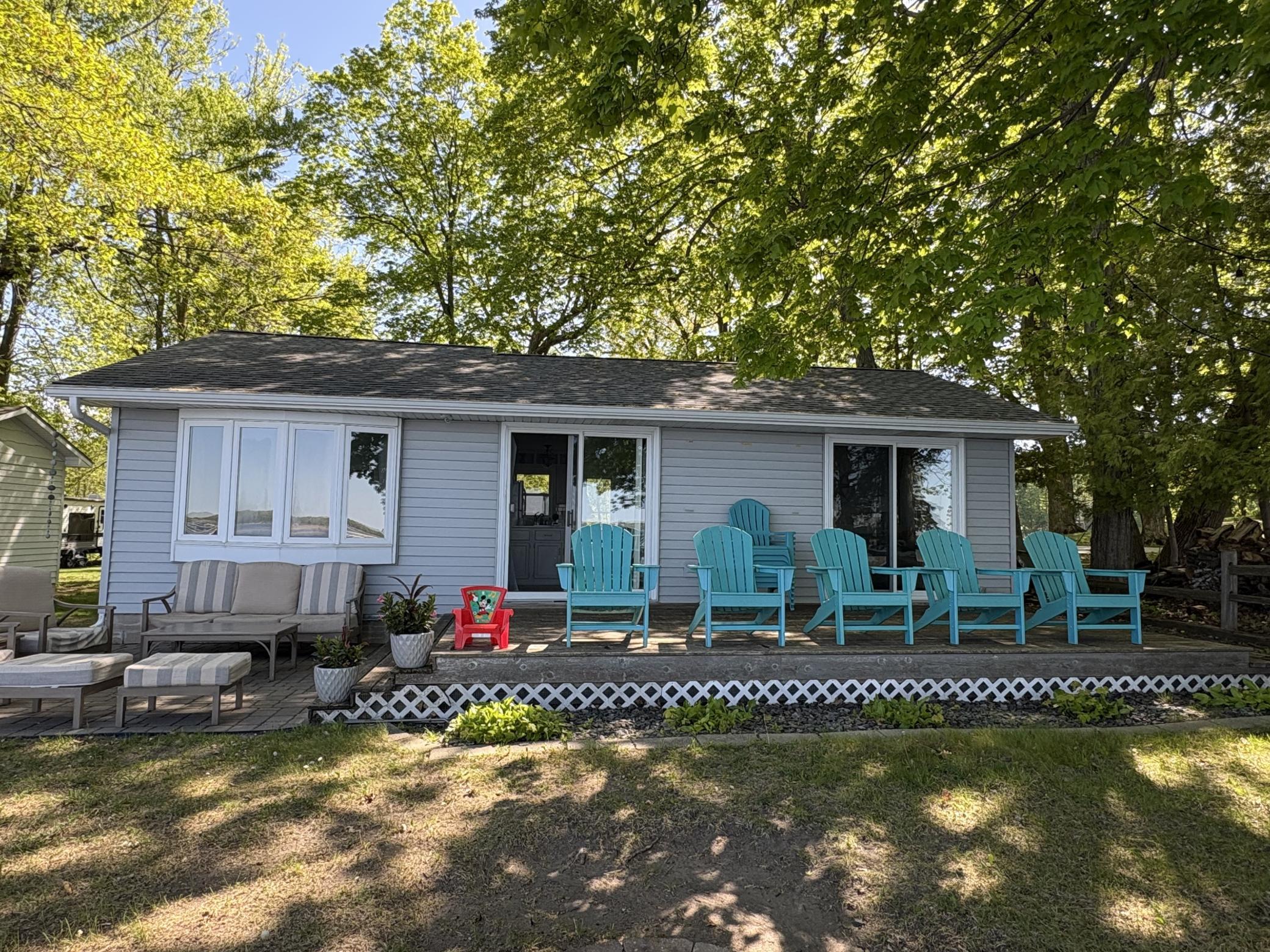 The 12 x 24 deck is perfect for everyone to gather by the lake and enjoy all the festivities by the lake. Also walks down the another patio area.