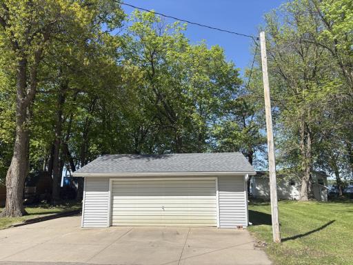 The detached 24' x 22' garage offers ample space for vehicles, storage, or your lake toys during the off-season. The concrete driveway and side concrete on the side offers plenty of parking.