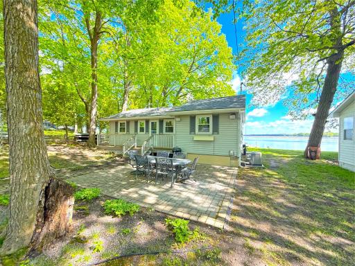 With several outdoor entertaining areas, thereâ is no shortage of spots for friends and family to relax and soak in the lake atmosphere. The canopy of trees provides relief from all the sun and fun on the lake.