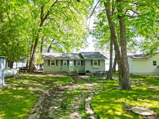Here is the walk up to your lake place, mature treed line the lot with 50 feet of level shoreline.