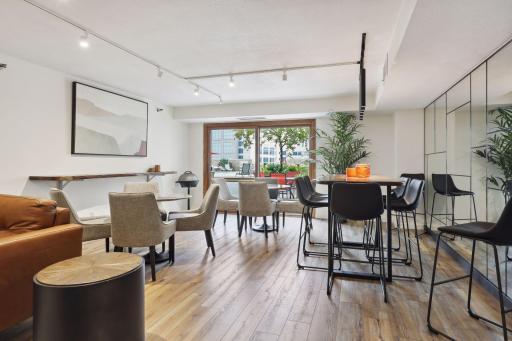 Partyroom opens up to tons of decking and pool