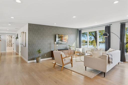 Neutral textures and warm wood tones create a relaxed, sophisticated atmosphere.