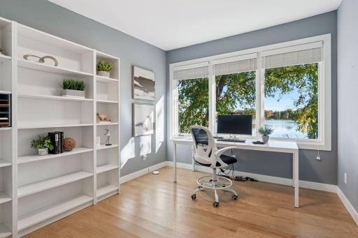 Gilfillan Lake glistens through every window.