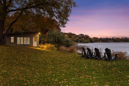 A boat house overlooks the lake and is a perfect spot for an office, studio or spa/yoga space.