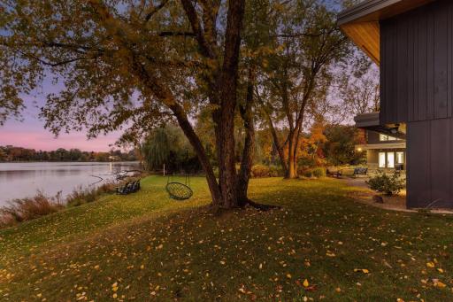 An expansive landscaped lot with gorgeous trees and stunning landscaping.