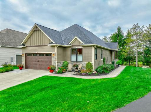 Situated within the New Richmond Golf Club community, this stunning 3 bed, 3 bath like-new home offers the ease of main-level living and over 3,000 square feet of thoughtfully designed space. Restaurants, breweries, and shopping are minutes away.