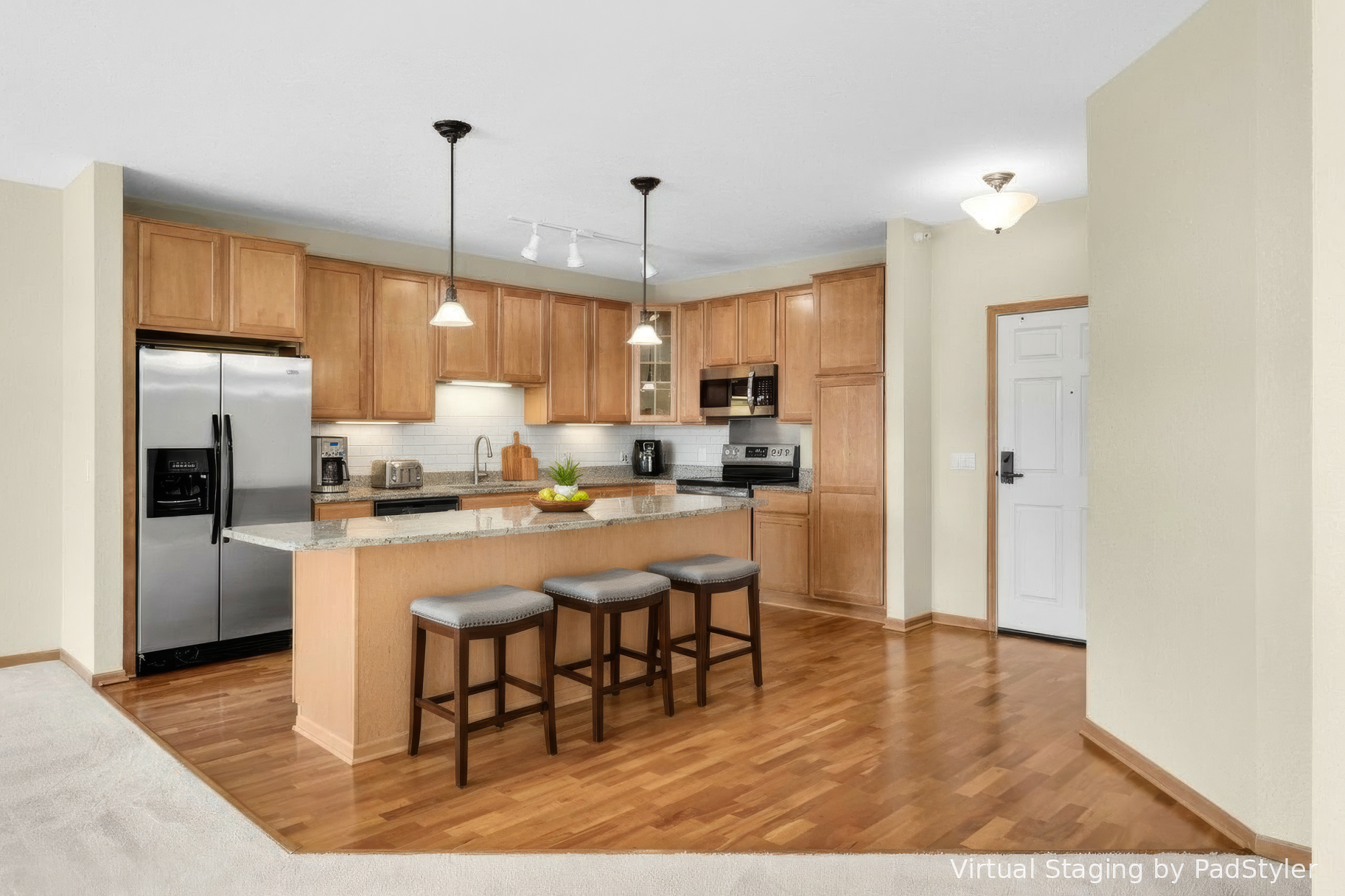 Virtually Staged Photo. Bright and open kitchen designed for both style and function.