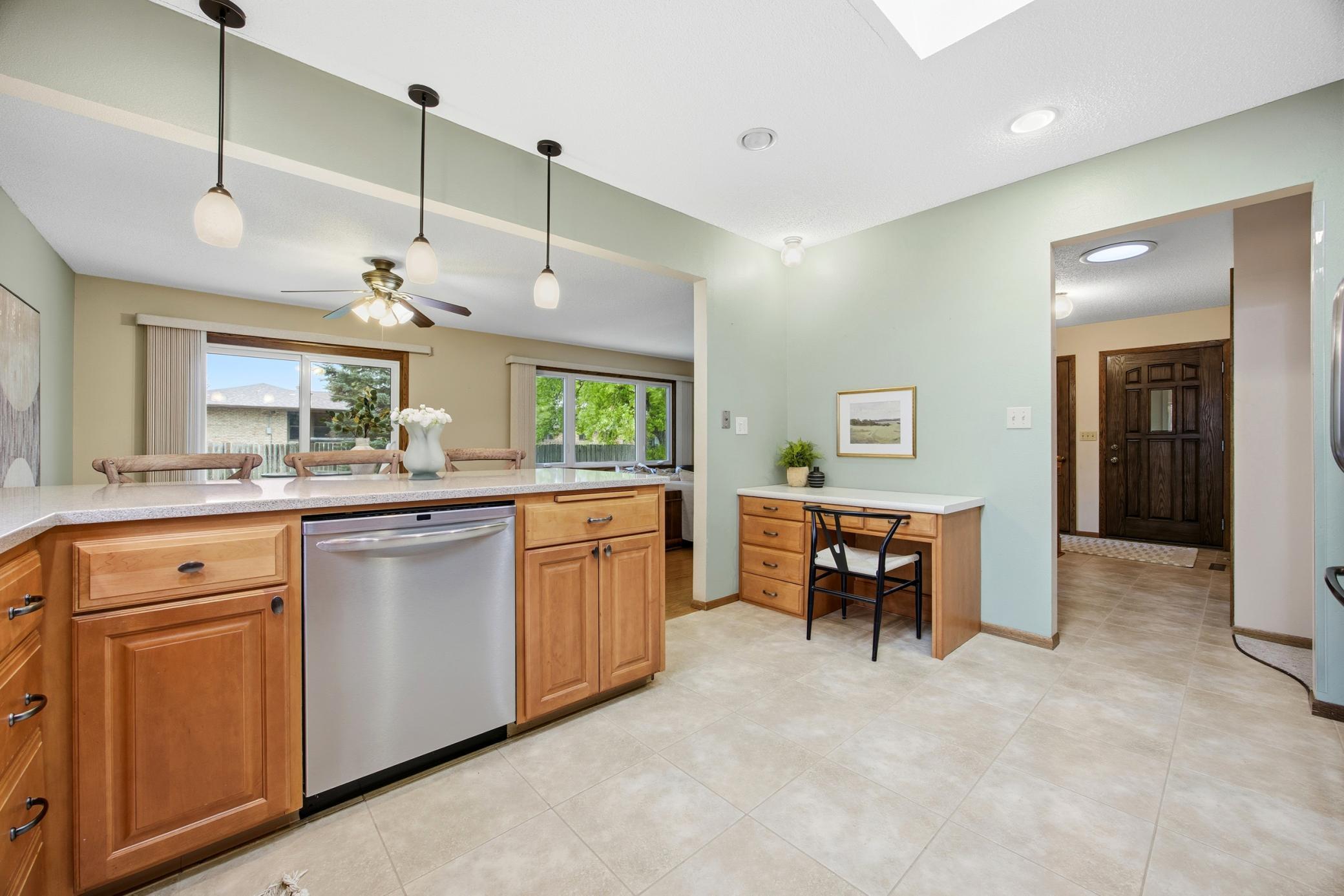 Quartz countertops and convenient built in desk