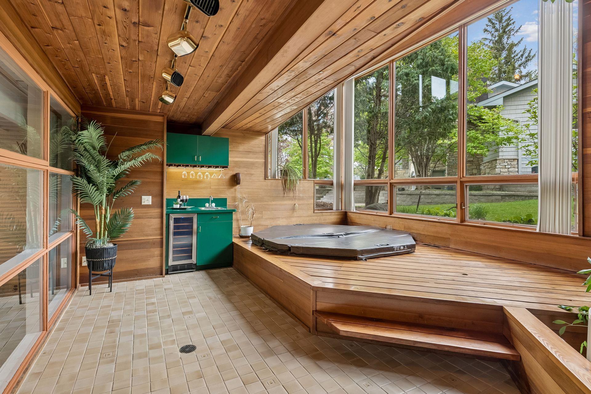 the cedar ceilings, dramatic rooflines, walls of glass, floating transitions, and connection to nature give it a true “architect-designed sanctuary” feeling.