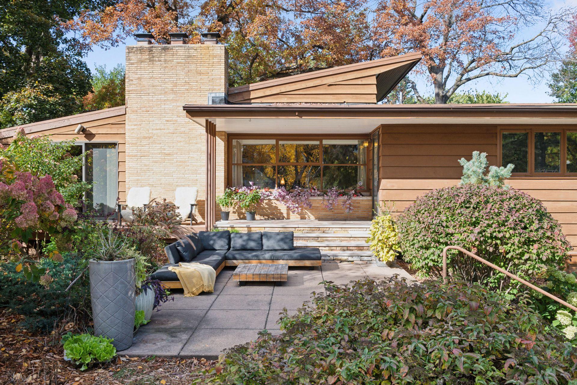 Perched above the street, make the use of the front patio is a luxury few homes have.