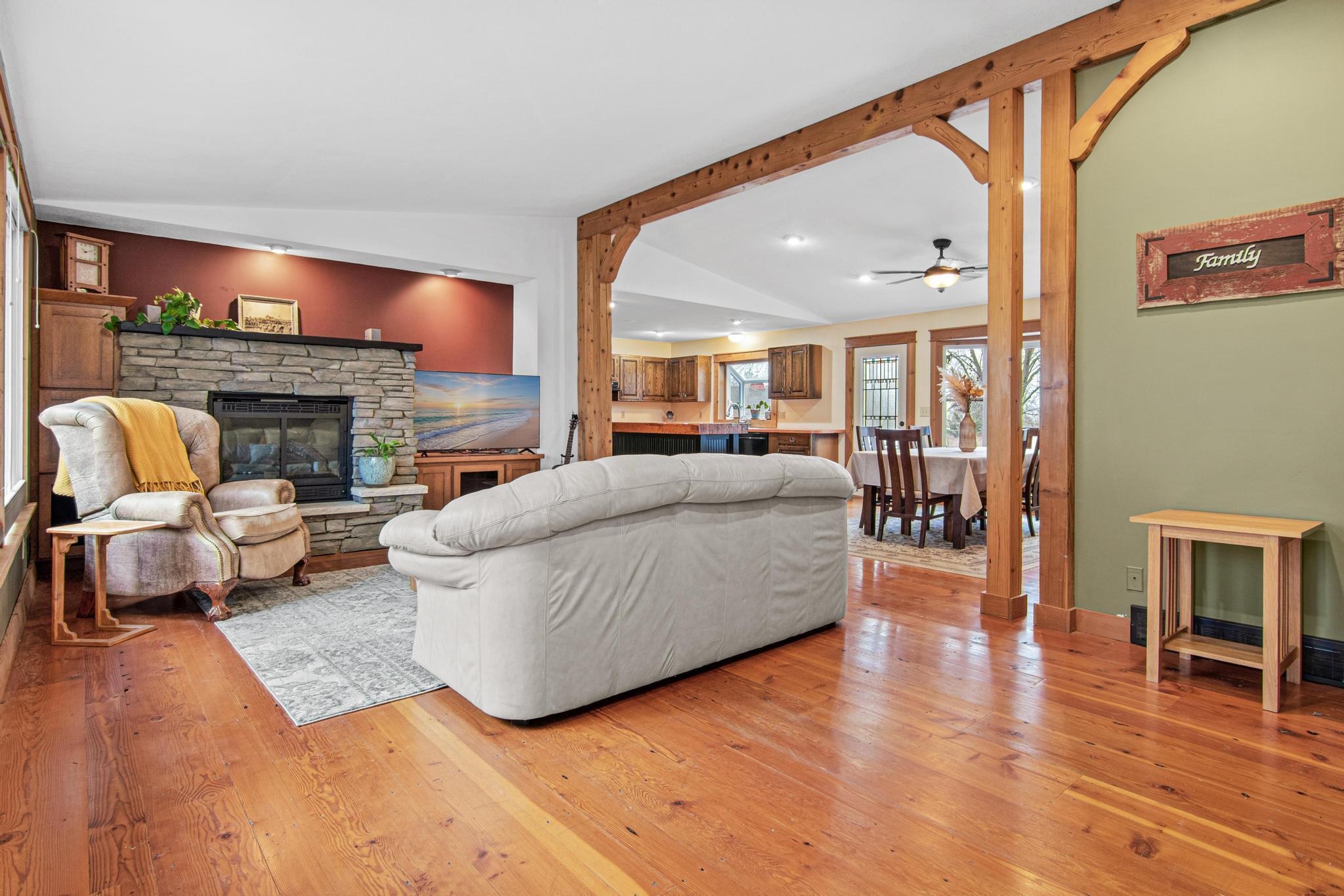 Gorgeous wood floors, beams and stunning fireplace greet you and your guests.