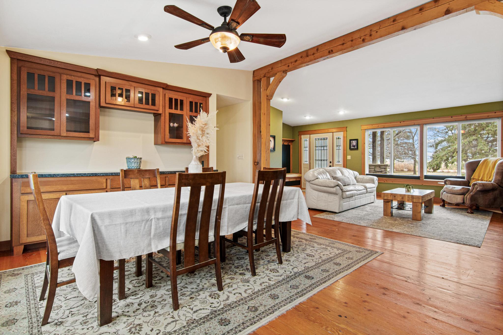 Dining room connects the kitchen and living rooms.