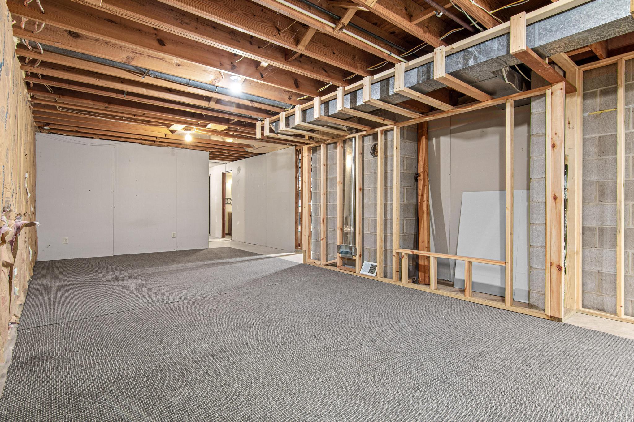 Lower level unfinished space ready for your customizations.