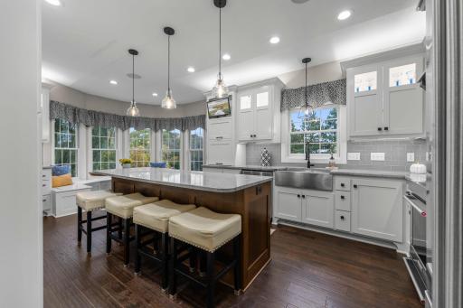 The gourmet kitchen, beautifully remodeled in 2018, is a showstopper.